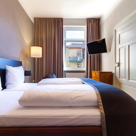 Qube Hotel Bergheim Heidelberg Bagian luar foto