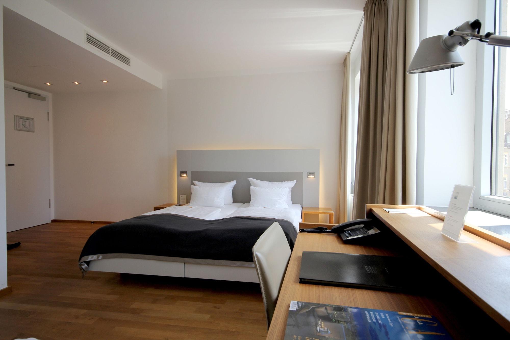Qube Hotel Bergheim Heidelberg Bagian luar foto