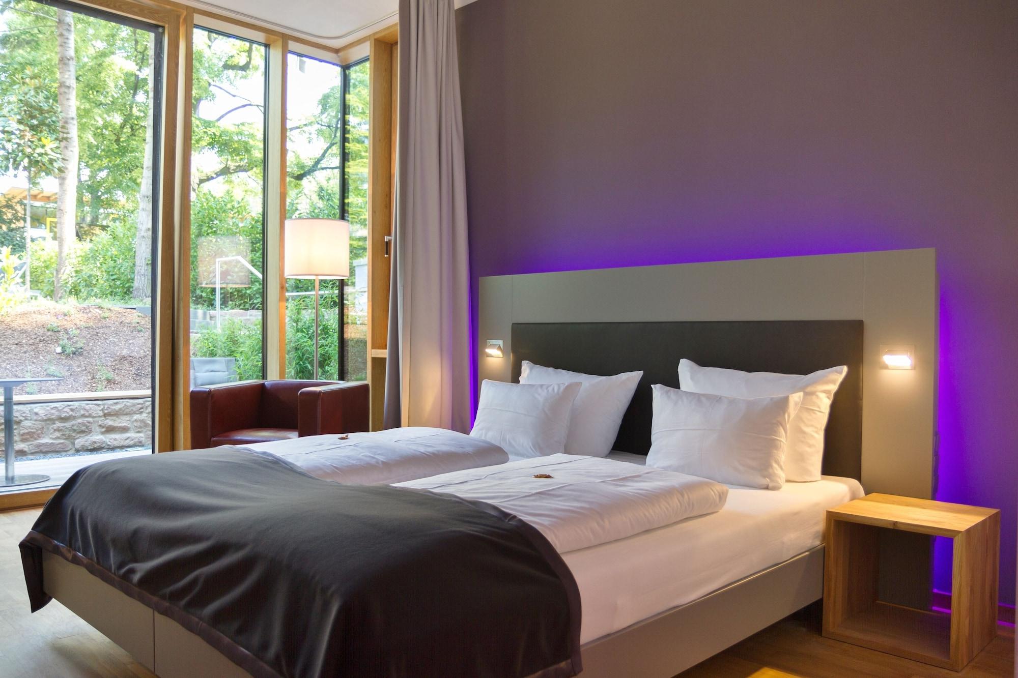 Qube Hotel Bergheim Heidelberg Bagian luar foto