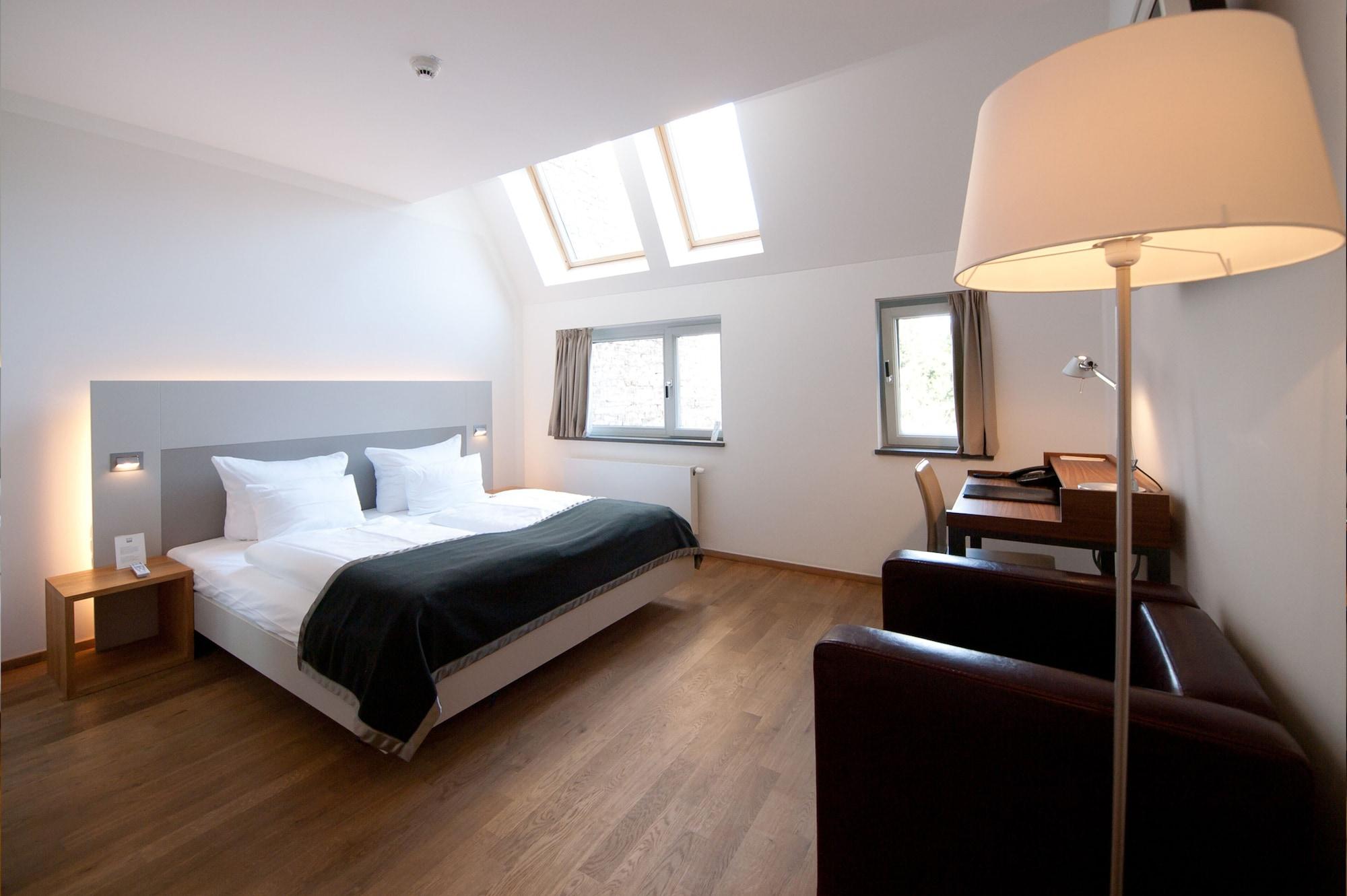 Qube Hotel Bergheim Heidelberg Bagian luar foto