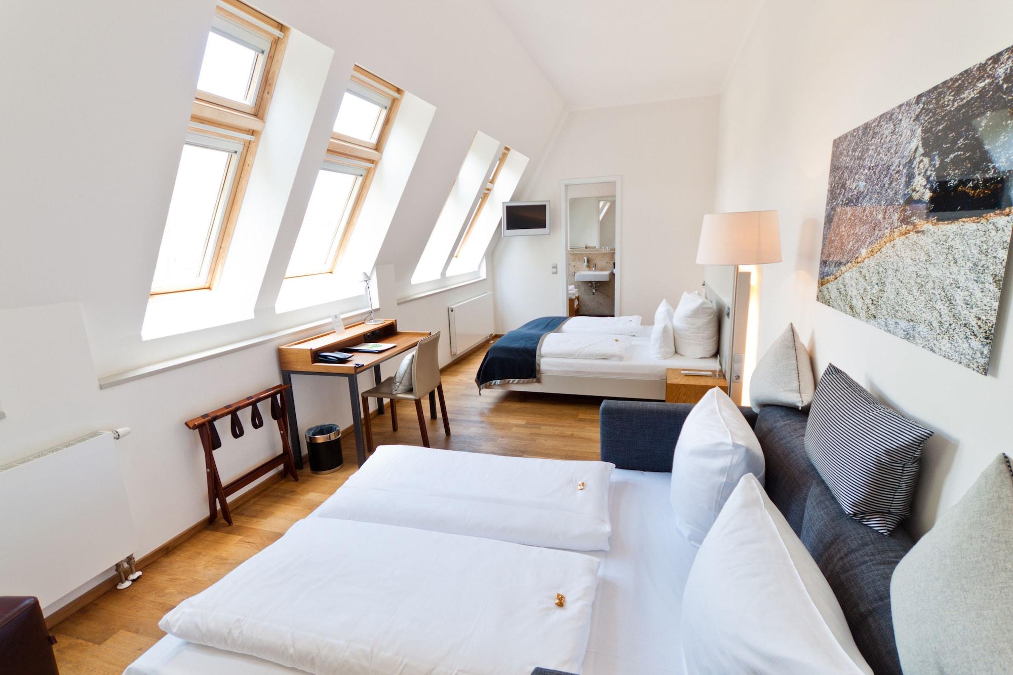 Qube Hotel Bergheim Heidelberg Bagian luar foto