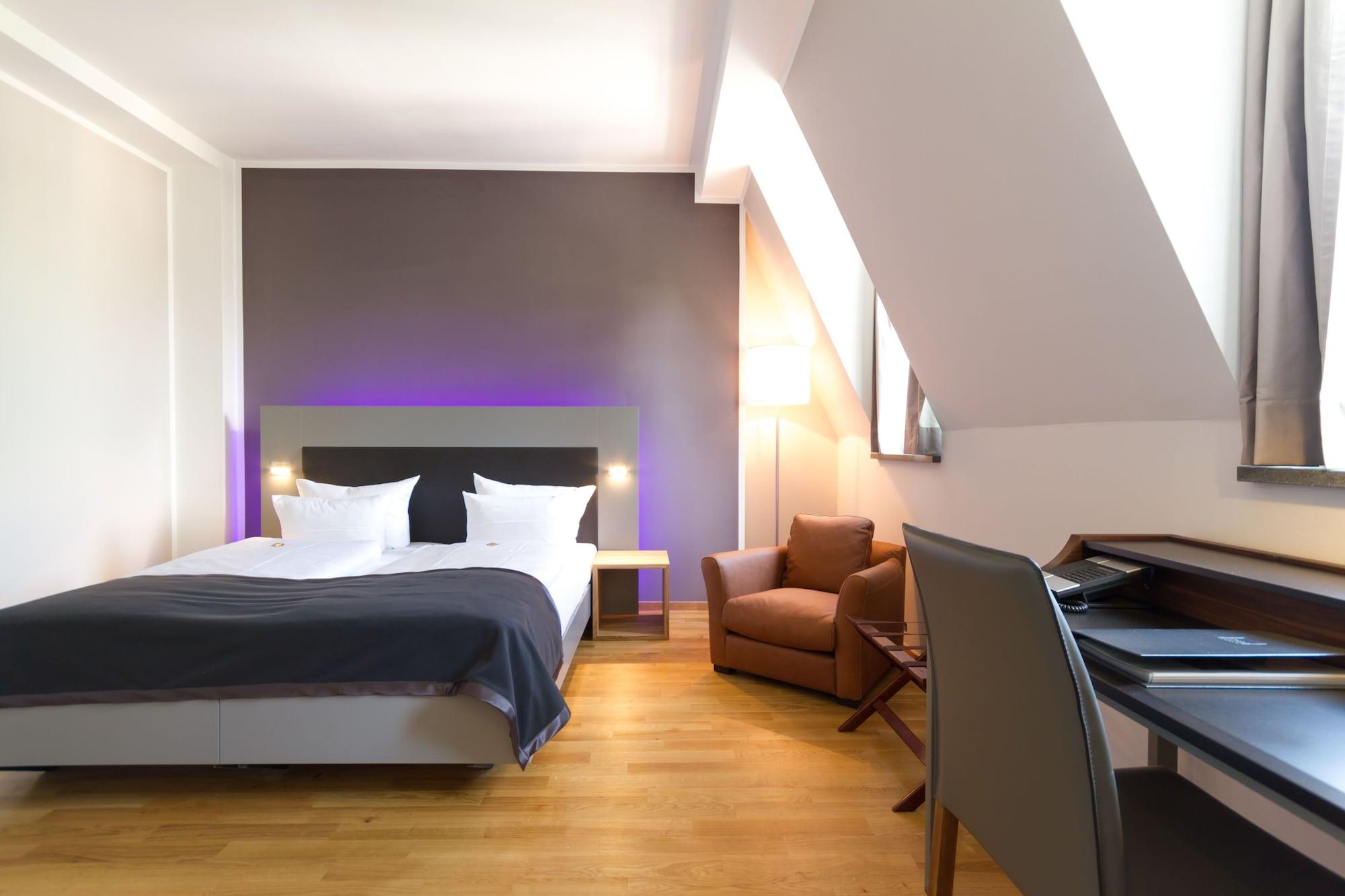 Qube Hotel Bergheim Heidelberg Bagian luar foto