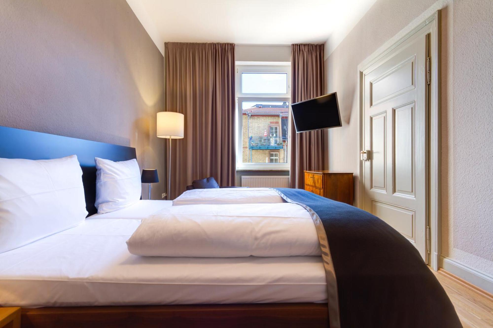 Qube Hotel Bergheim Heidelberg Bagian luar foto
